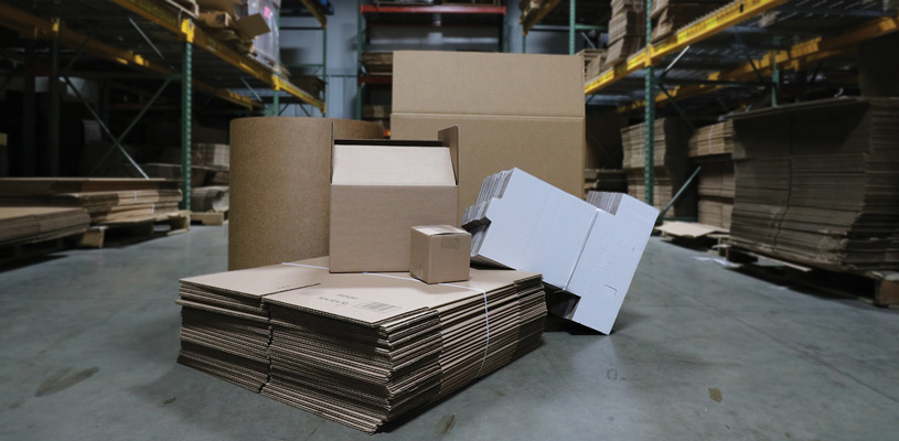 stacks-of-flattened-boxes-in-the-Binger-Shipping-Supplies-warehouse