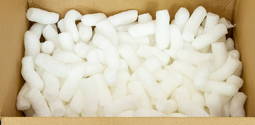 cardboard box filled with biodegradable packing peanuts